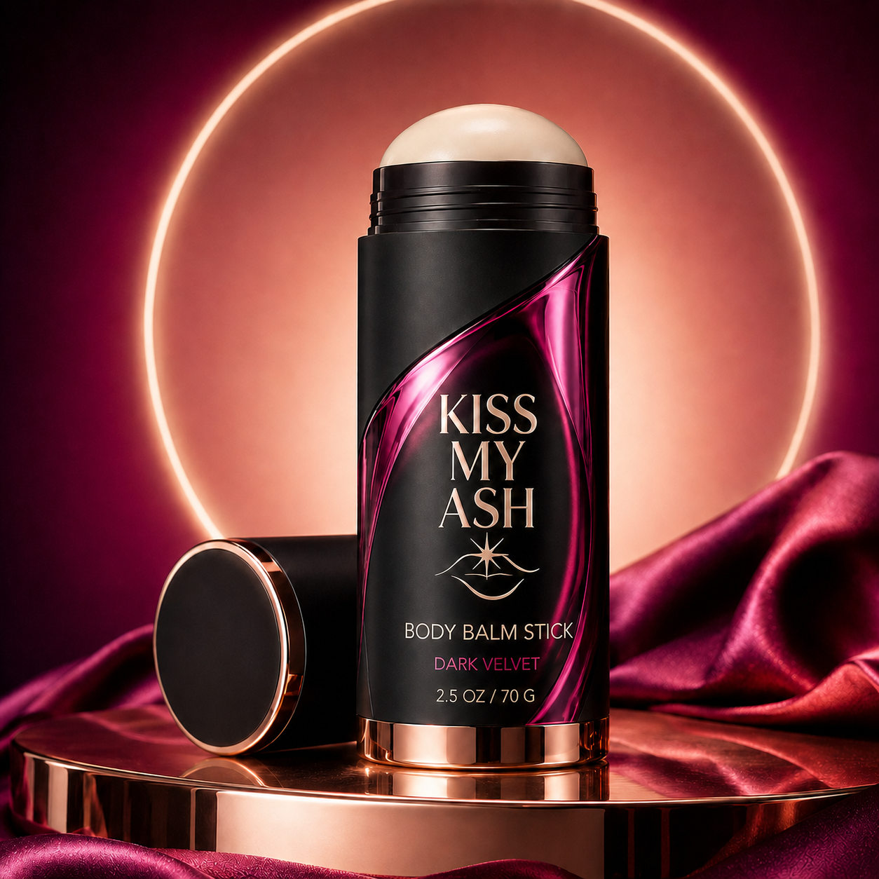 Kiss My Ash moisturizing body balm stick in a black twist-up container